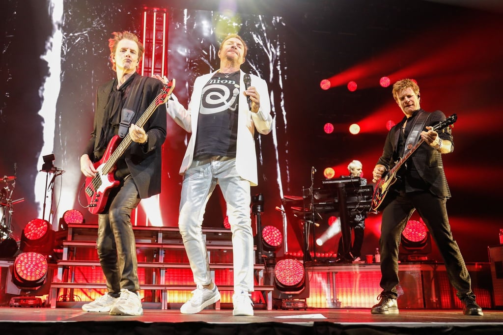 John Taylor (l-r), Bassist, Simon Le Bon, Sänger, und Dom Brown, Gitarrist, von Duran Duran bei einem Konzert in Tampa, Florida.