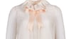 Eine von Prinzessin Diana getragene blass-rosafarbene Bluse steht zur Versteigerung.