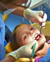 Zu viele Kinder in Sachsen-Anhalt haben schlechte Zähne. Armut erhöht dieses Risiko dafür.