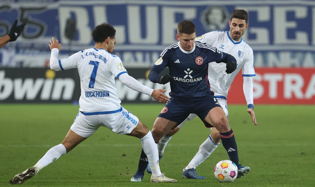 Schieden mit dem FCM aus dem DFB-Pokal aus: Herbert Bockhorn (l.) und Cristiano Piccini (r.).