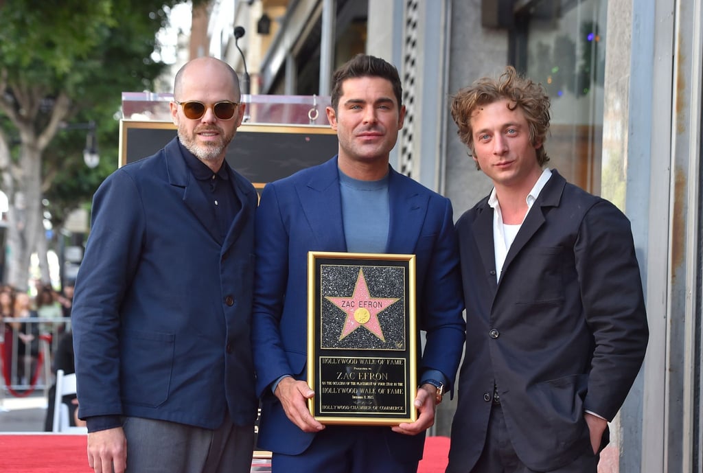 Filmregisseur Sean Durkin (l-r), Zac Efron und Schauspieler Jeremy Allen White nehmen an der Zeremonie teil.