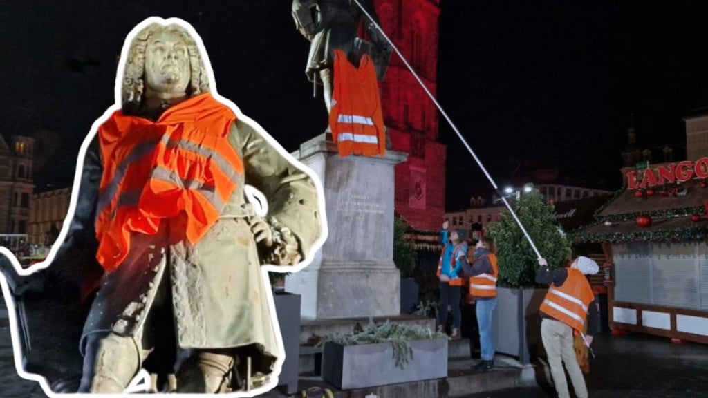 Händel in Warnweste: Eine Protest-Aktion der Letzten Generation Halle.
