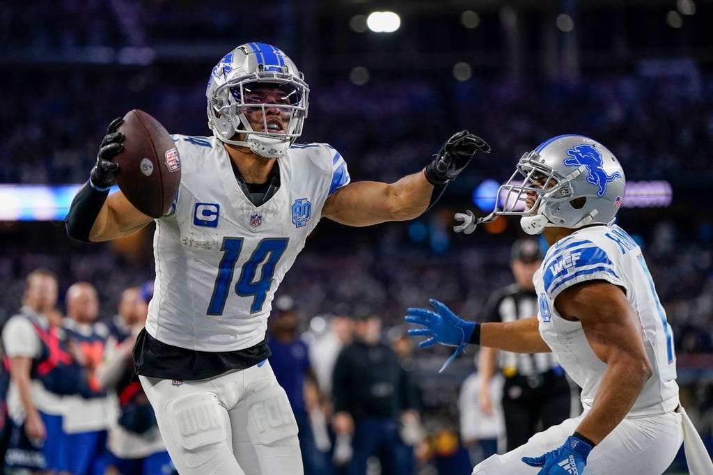 Der Deutsch-Amerikaner Amon-Ra St. Brown (l) hat die beste Saison seiner jungen NFL-Karriere gespielt.