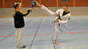 Abdullah Bilgin aus Osterburg (Kreis Stendal) zeigt in der Wischelandhalle in Seehausen eine Kampfübung des Taekwondo mit Trainer Xuan Anh Nguyen. Der 15-Jährige hofft auf die Teilnahme an der Weltmeisterschaft in Korea im Oktober 2024.