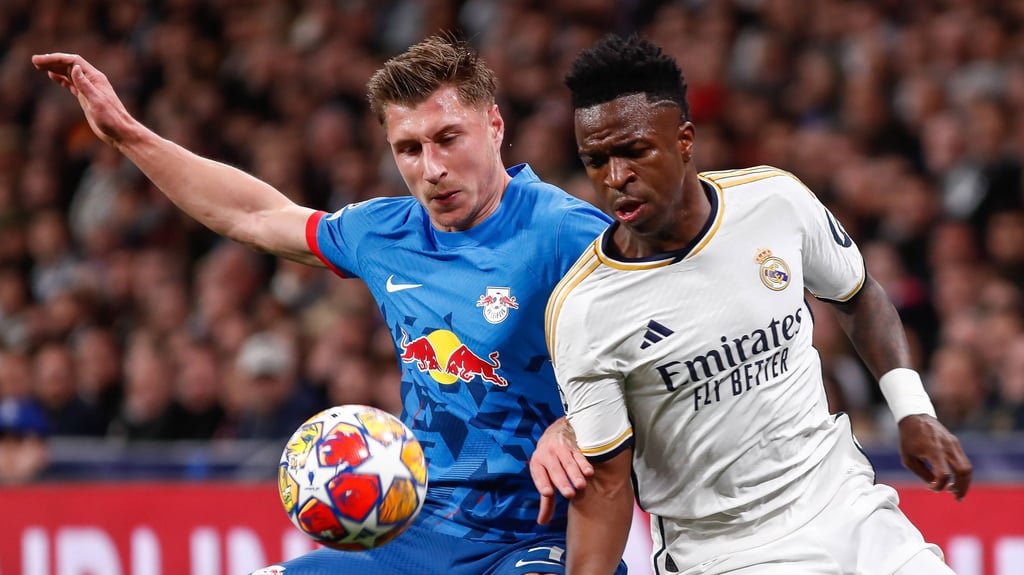 Waren keine Freunde im Estadio Santiago Bernabeu: RB-Abwehrchef Willi Orban und Real-Stürmer Vini Jr.