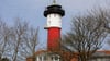 08.04.2018, Niedersachsen, Wangerooge: Ein Blick auf den alten Leuchtturm der Insel.
