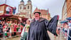Das Hochzeitspaar von  „Luthers Hochzeit“ im Jahr 2023 während des Umzuges durch Wittenberg 
