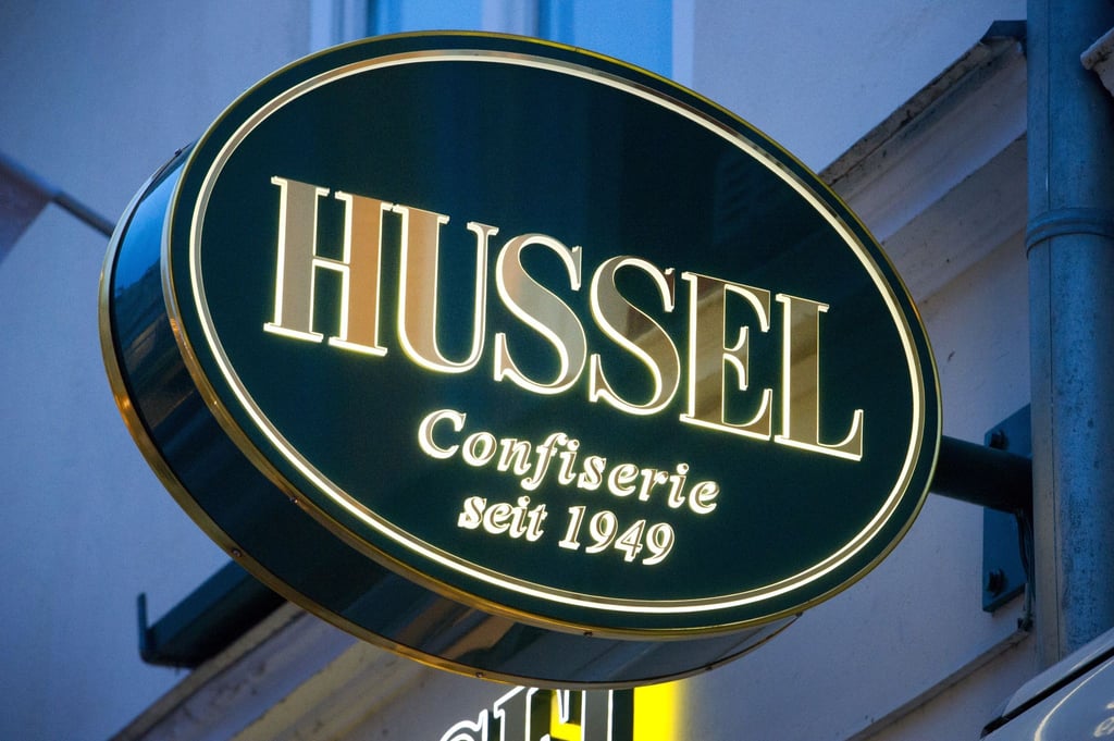 Das Logo der Confiserie „Hussel“.