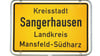 Blick auf das Ortsschild der Kreisstadt Sangerhausen (Sachsen-Anhalt).