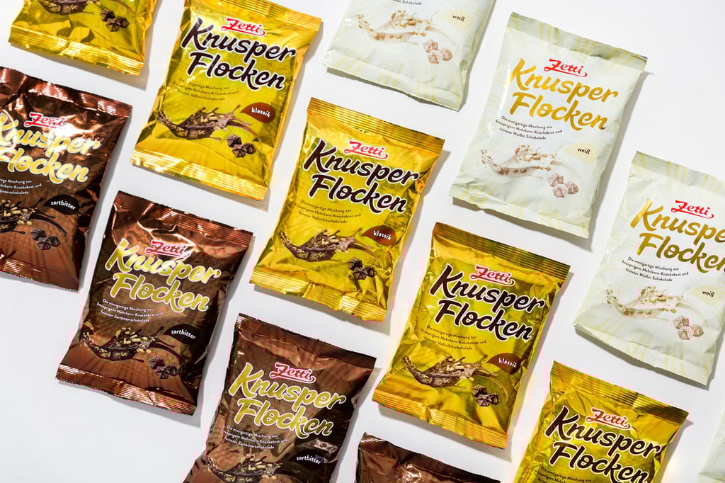 Knusperflocken gibt es in den Geschmacksrichtungen Vollmilch, weiße Schokolade und Zartbitter.
