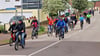 Die in Havelberg gestartete Sternradtour erreichte das Ziel  in Sandau. Zusammen mit den anderen Touren wurde das Radlerfest auf dem Kirchberg gefeiert. Unterwegs am Knotenpunkt 99 im Mühlenholz bei Havelberg hatten sich Landrat Patrick Puhlmann und weitere Radler der Gruppe angeschlossen.