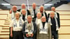 Gruppenfoto der Europapokalsieger vom 1974: Die Idole des 1. FC Magdeburg haben sich am 8. April 2024, genau 50 Jahre nach dem Triumph in Rotterdam, ins Goldene Buch der Stadt Magdeburg eingetragen.