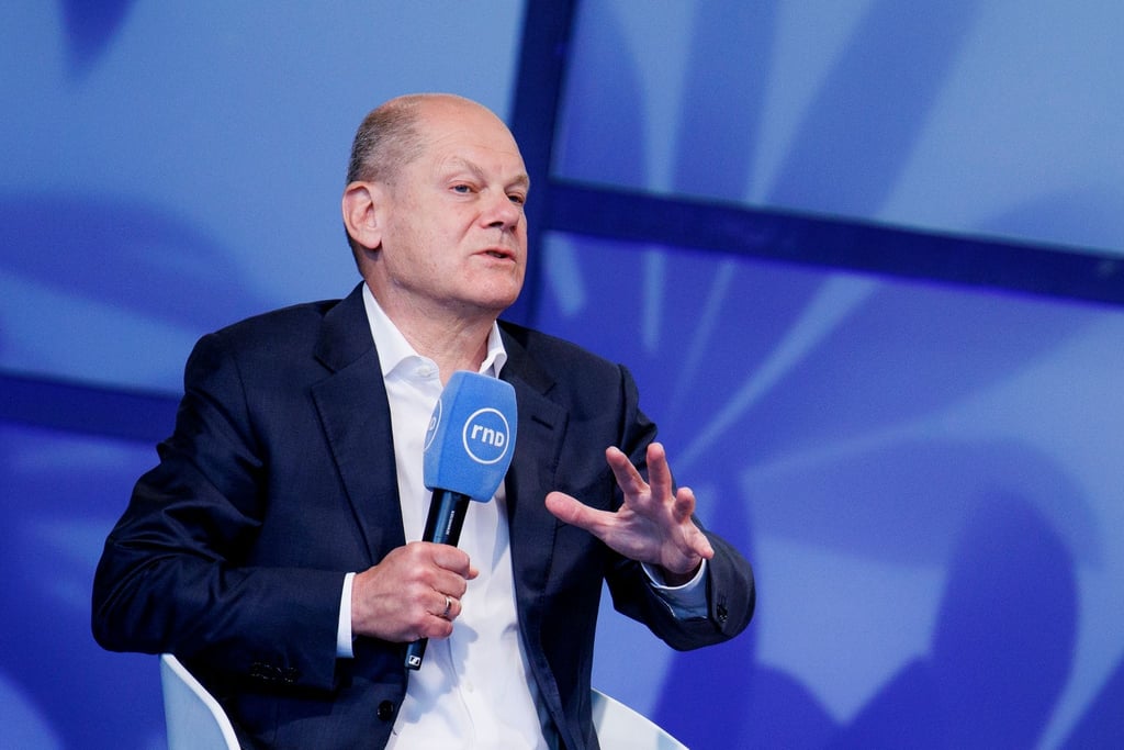 Bundeskanzler Olaf Scholz (SPD) spricht.