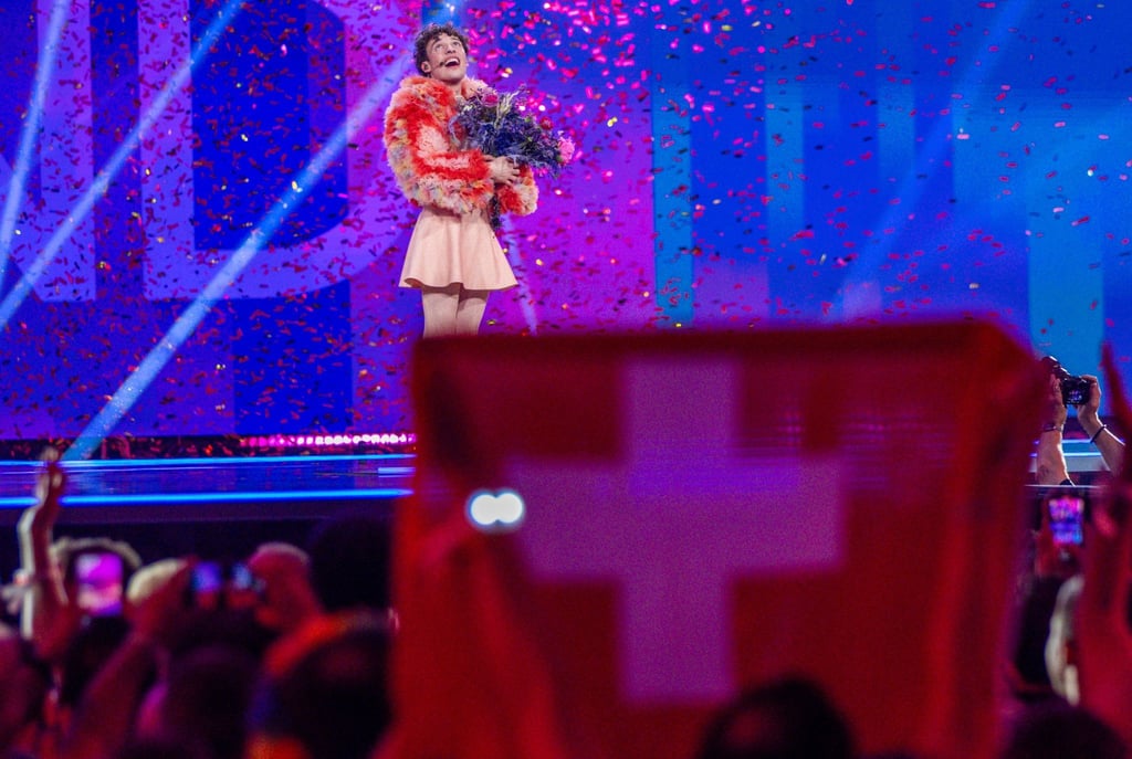 Nemo jubelt nach dem Gewinn im Finale des Eurovision Song Contest. Im nächsten Jahr findet das Finale in der Schweiz statt.