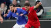 FCM-Eigengewächs Eldin Dzogovic (re.) im Duell mit Weltklasse-Spieler Theo Hernandez im Testspiel der luxemburgischen gegen die französische Nationalmannschaft.
