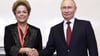 Russlands Präsident Wladimir Putin (r) und die ehemalige brasilianische Präsidentin Dilma Rousseff: Die russischen Behörden nutzen das Forum als Schaufenster, um die Entwicklung des Landes zu präsentieren und Investoren anzulocken.