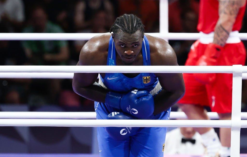 Boxer Nelvie Tiafack hat eine olympische Medaille sicher.