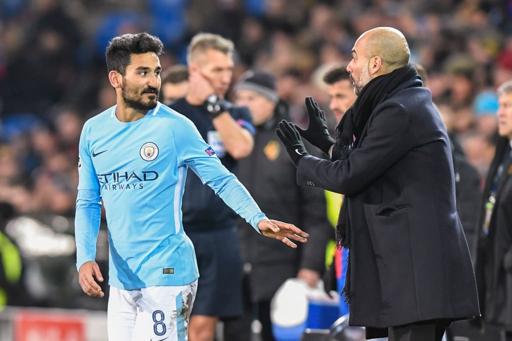 Wieder vereint: Ilkay Gündogan (l) und Pep Guardiola.