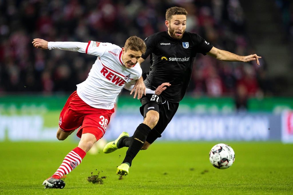 Dezember 2018: Magdeburgs Rico Preißinger im Duell mit Kölns Niklas Hauptmann.