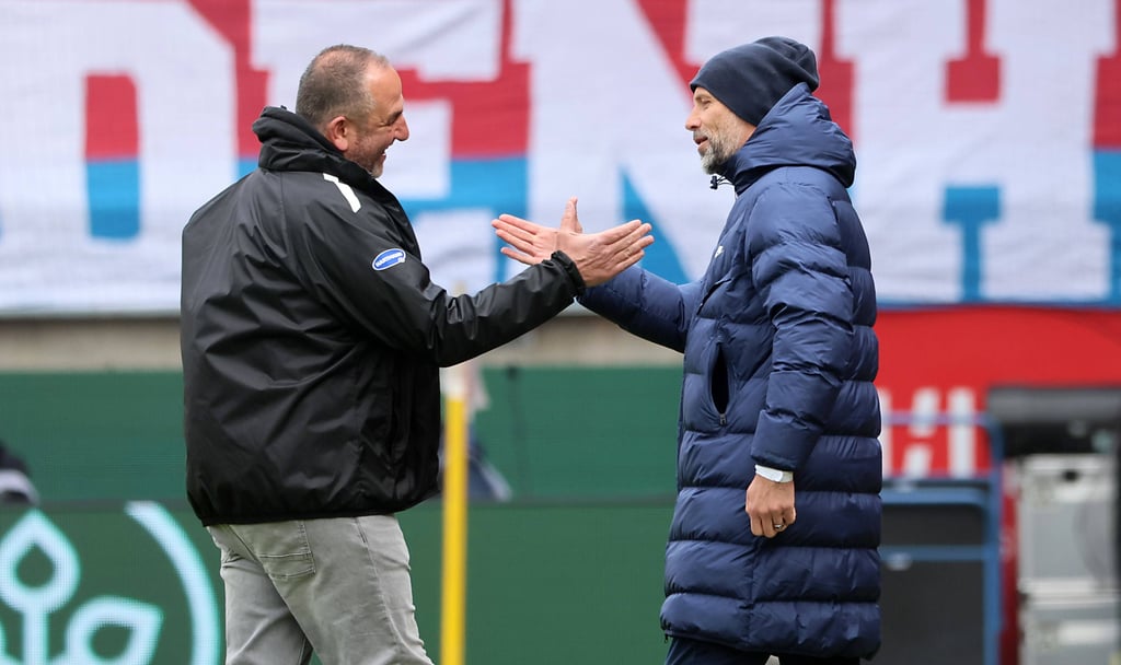 Heidenheim-Trainer Frank Schmidt (l.) und RB-Coach Marco Rose.