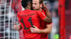 Bayerns Torschützen beim Jubel: Kingsley Coman (l) und Harry Kane.