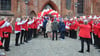 Festakt anlässlich des 70-jährigen Vereinsbestehens des Seehäuser Carnevalsclus (SCC) am 16. November 2024 in der Salzkirche Seehausen:  Die organisierten Narren in Rot-Weiß empfangen ihre Gäste mit lautstarkem „Seehausen, hajo“.