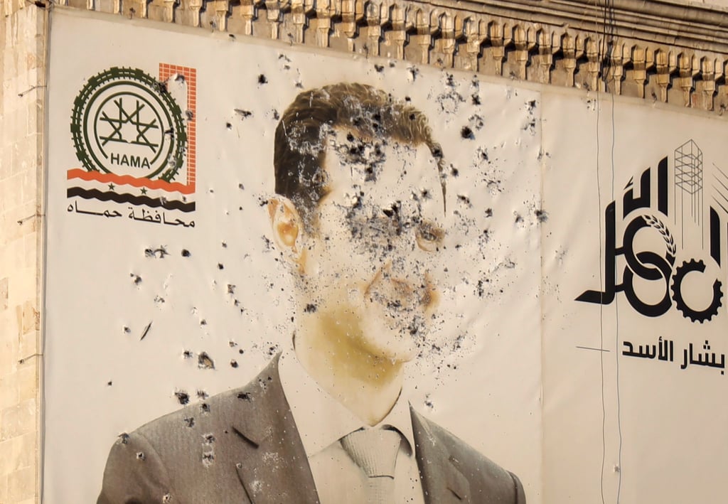 Die Rebellen bejubeln die Flucht von Assad.