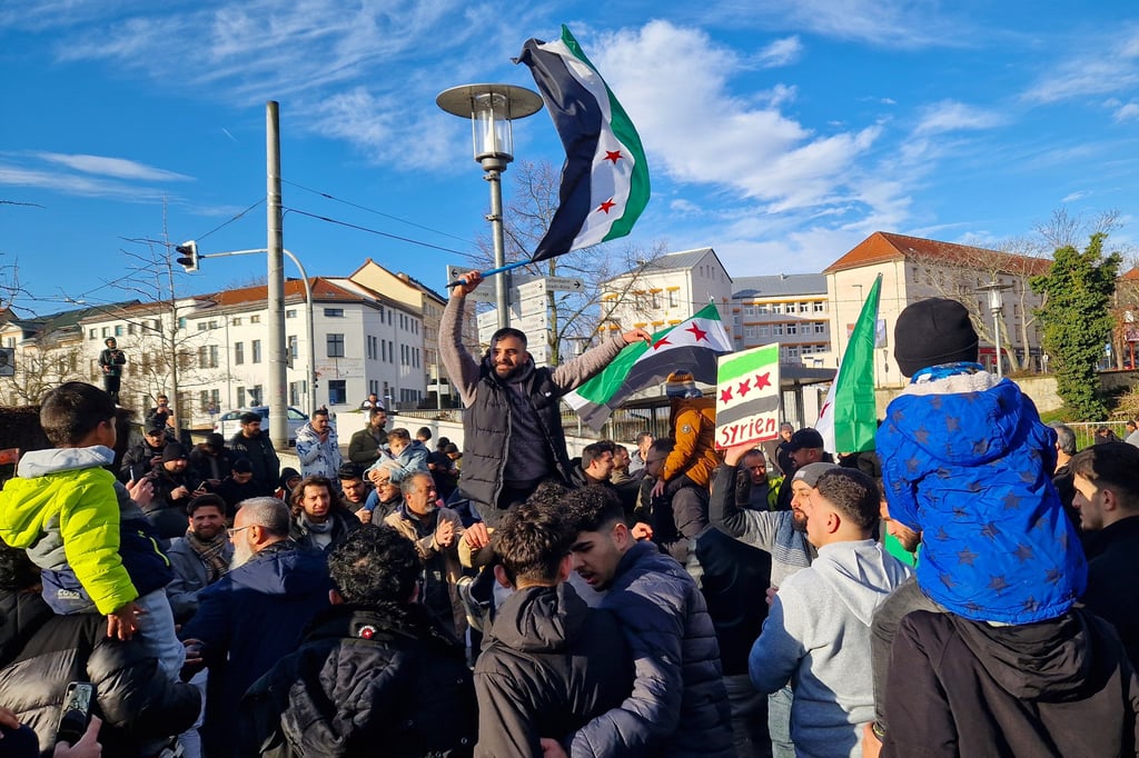 In Merseburg (Saalekreis) feiern Syrer am Sonntag den Sturz des Diktators.