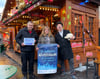 V.l.: Sebastian Meyer, Vorsitzender des Schaustellerverbandes, City-Managerin Beate Fleischer und Händler Dieter Wunder laden zum Wintermarkt in Halle.