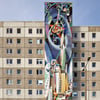 Plötzlich „Ostmoderne“: Ehemaliges Studentenwohnheim in Halle-Neustadt mit Majolika-Malerei von Josep Renau auf Fliesen mit dem Titel „Die vom Menschen beherrschten Kräften von Natur und Technik“ (1971–1974)