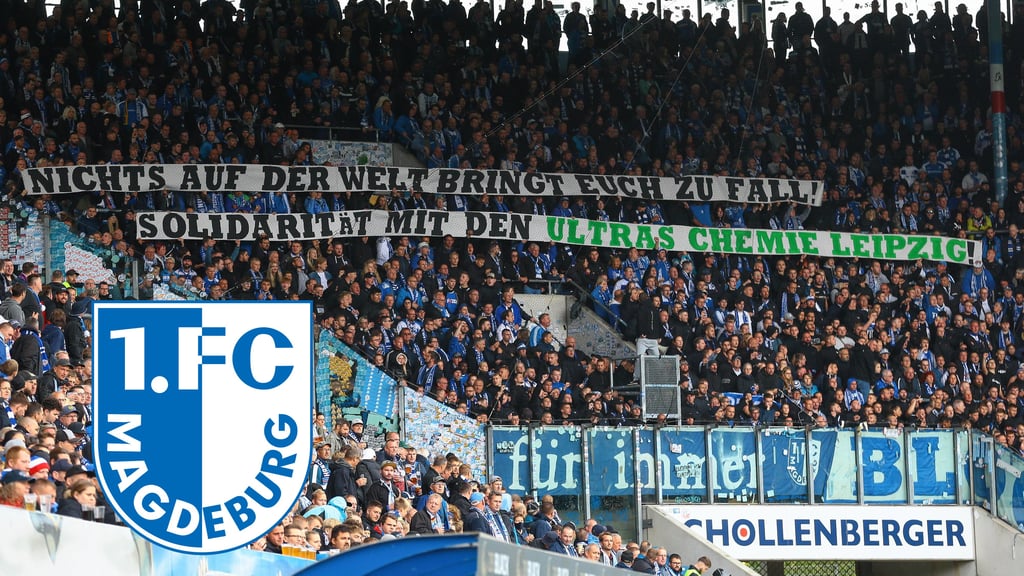 Spruchband der Magdeburg-Fans: "Nichts auf der Welt bringt euch zu Fall! Solidarität mit den Ultras Chemie Leipzig", beim Spiel des FCM gegen Hansa Rostock im September 2022.