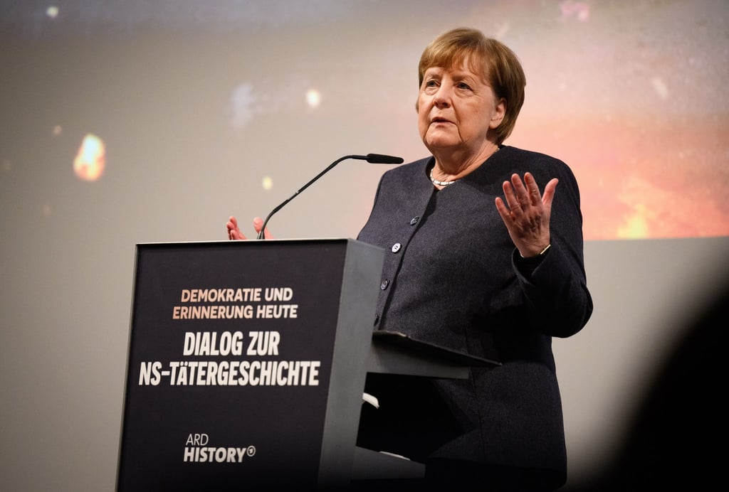 In ihrem Grußwort appellierte die ehemalige Bundeskanzlerin Angela Merkel an die jüngeren Generationen, sich mit den NS-Verbrechen auseinanderzusetzen.