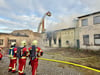 Die Feuerwehren beim Löscheinsatz in Roßlau.