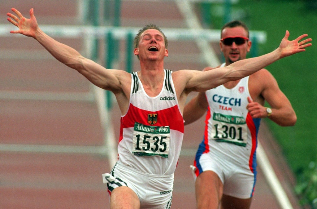 Frank Busemann (l) feierte bei den Olympischen Spielen 1996 seinen größten Erfolg.