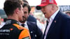 Donald Trump (r) inszenierte sich als Lando Norris' (l) Glücksbringer.