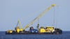 Das riesige Schiff, das vor der italienischen Mittelmeerinsel in etwa 50 Metern Tiefe liegt, soll bis Mitte Juni nach oben gebracht werden.