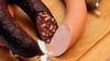 Bei abgepackter Wurst muss die Menge drin sein, die drauf steht.