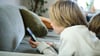 Was digitale Medien mit Kindern machen (Foto-Illustration).
