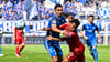 Livan Burcu (1. FC Magdeburg, li.) im Kampf um den Ball mit Myron van Brederode von Fortuna Düsseldorf.