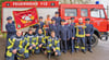 Kurz vor dem Jubliläum hat sich die Queiser Feuerwehr rund um Wehrleiter Mirko Starke (r.) zu einem Fotoshooting zusammengefunden.
