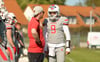 Trainer Daniel Woge und Friedemann Schlicht (r.).
