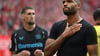 Ob Jonathan Tah (r.) schon bei der Club-WM für den FC Bayern spielen kann, hängt auch von Bayer Leverkusen ab.