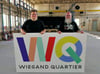 Roberto Hoffmann und Frank Schulz präsentieren Logo und Veranstaltungshalle