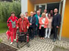Einige Mitglieder der Siedlergemeinschaft Magdeburg-Nordwest haben sich versammelt, um über die fehlende Einkaufsmöglichkeit im Stadtteil zu sprechen. 