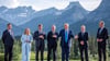 Beim „Familienfoto“ der G7 äußerte Trump sich zu seiner vorzeitigen Anreise.