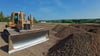 Ein Energiepark entsteht in Blankenburg auf einem dafür aufgefüllten und verfestigten Areal zwischen U&W und den ehemaligen Harzer Werken. Im Hintergrund sind das Industriegebiet Oesig mit der Firma Harzer Metallprofile und der MLK-Schornstein zu sehen.