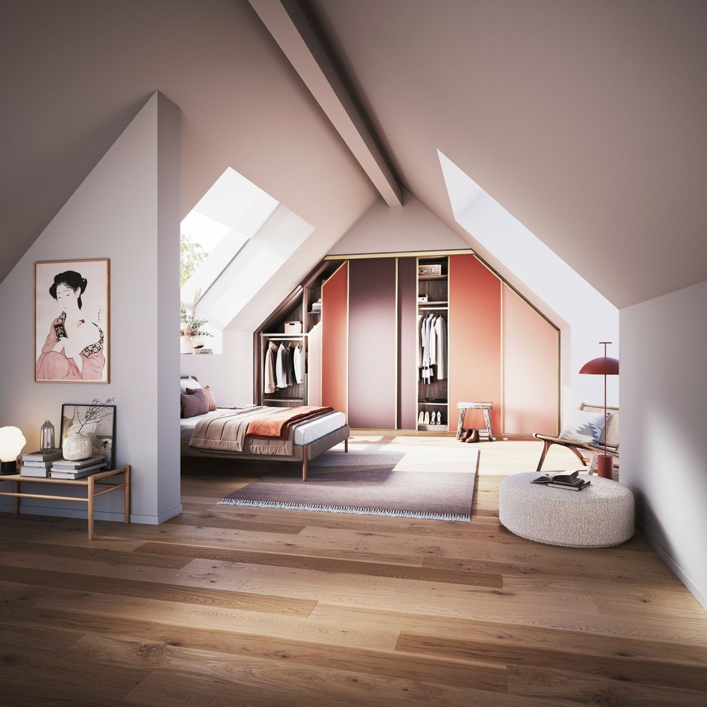Helle Farben und ein perfekt passender Einbauschrank - so wirkt die Einrichtung im Dachgeschoss harmonisch.