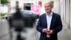 Bundeskanzler a. D. Olaf Scholz bei einem Besuch des Leibniz-Zentrums für Zeithistorische Forschung Potsdam (ZZF) und einer Foto-Ausstellung zum Alltag in der ukrainischen Stadt Lwiw