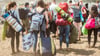 Festival mit Gepäck: Im Idealfall sollte man nicht mehr als 10 bis 15 Prozent des Körpergewichts auf dem Rücken tragen.