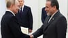 Kremlchef Putin im Gespräch mit Irans Außenminister Araghtschi (Archivbild)